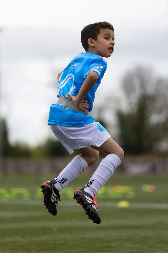Youth athlete performing plyometric jump at EPP strength and conditioning session Birmingham